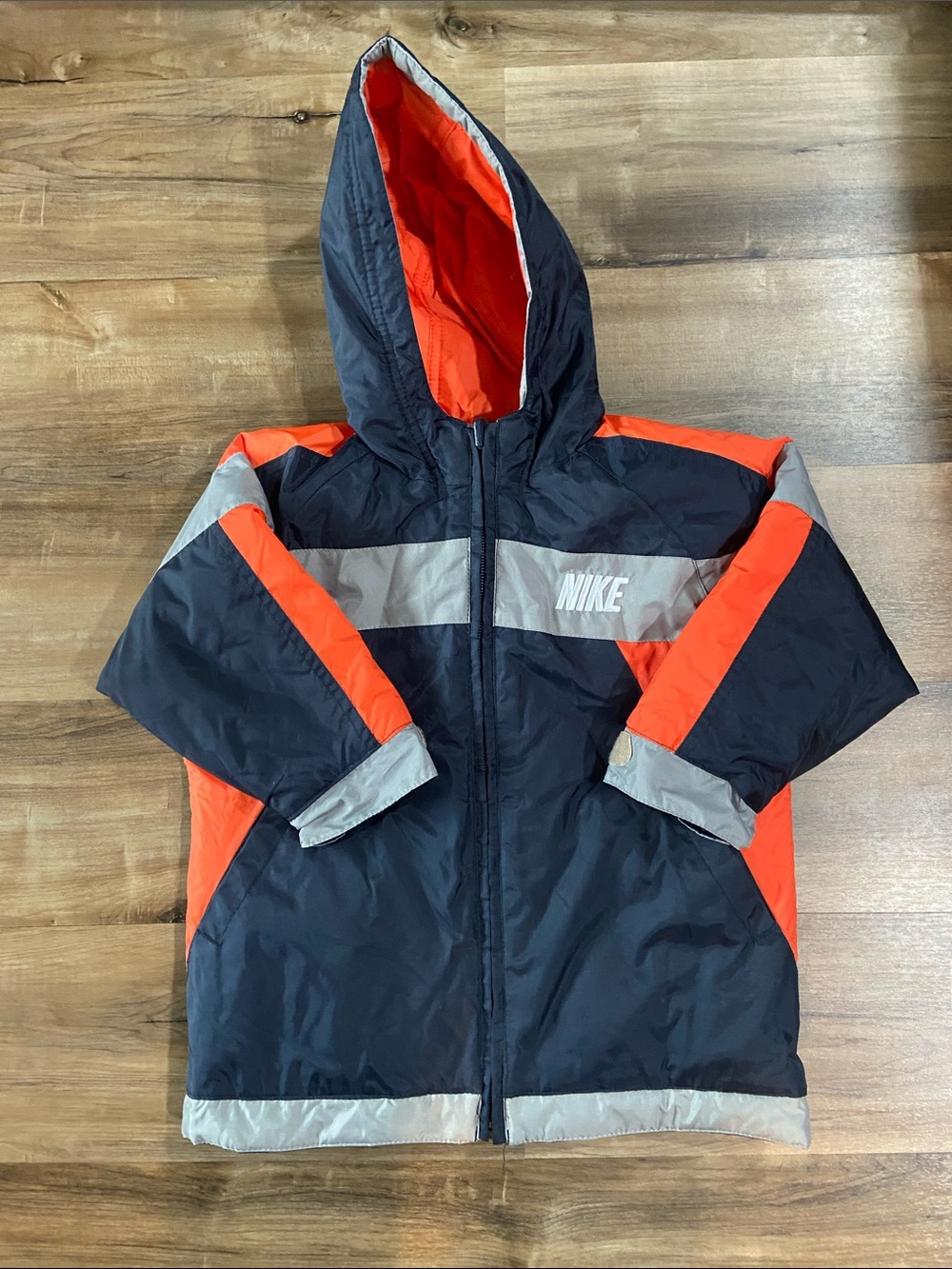 Nike Kids Navy and Orange Hooded Raincoat with Reflective Silver Trim